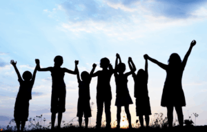 Group of children holding hands