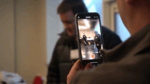 Filming on a mobile phone.