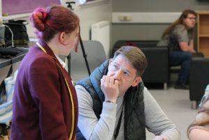 A pupil speaks to a youth worker