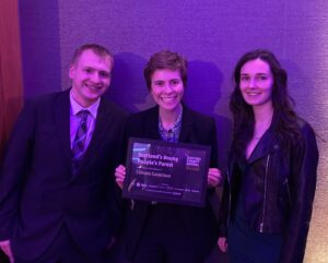 Three members of Scotland's Young People's Forest collect their finalist certificate at the Scottish Charity Awards.