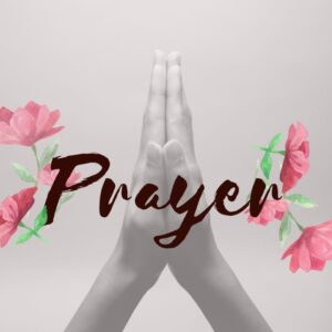 Picture of two hands together in prayer, and pink flower on either side. Text underneath reads 'Prayer'.
