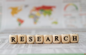 Scrabble letters spelling out the word research
