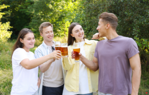 Group of young people drinking alcohol